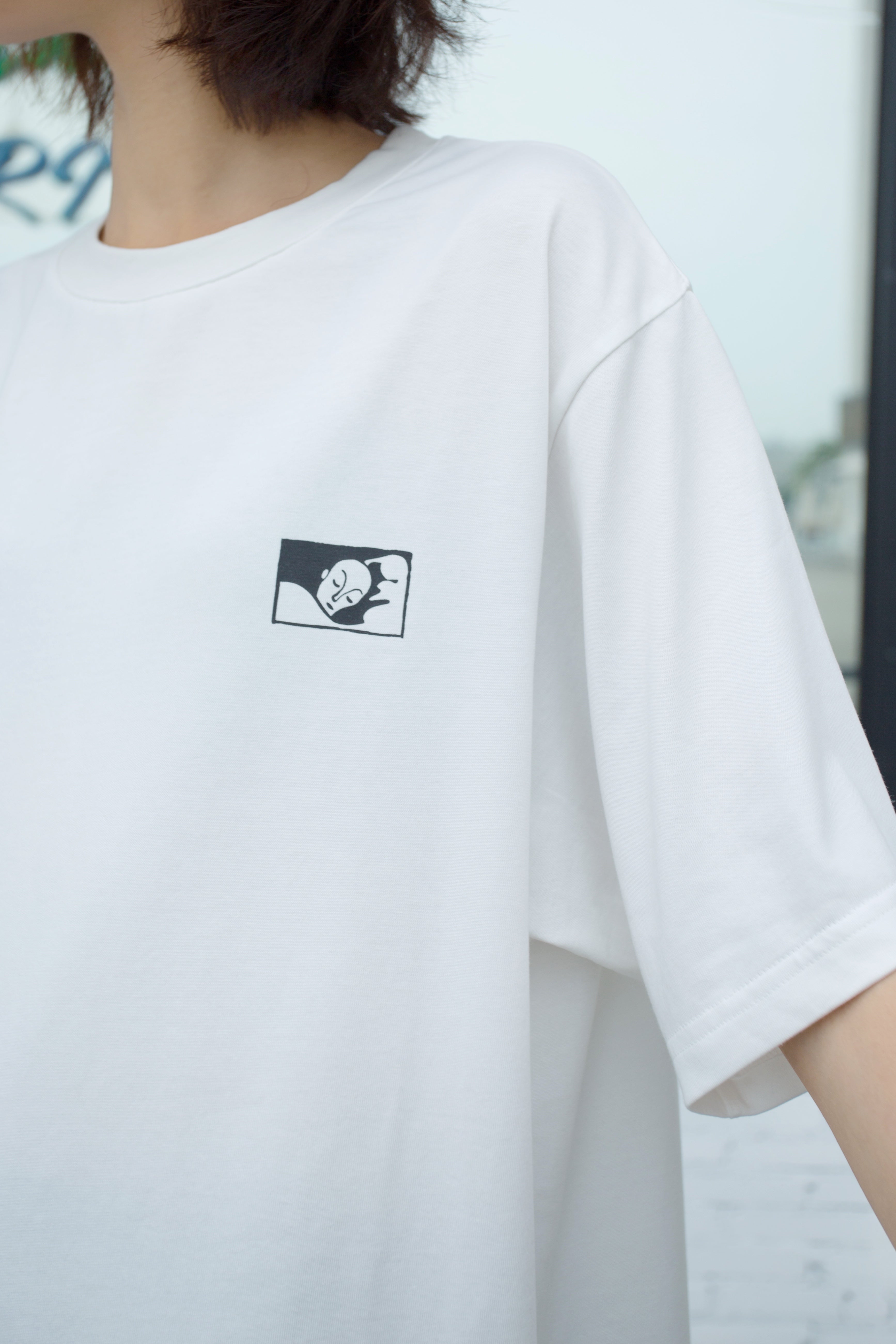 White emblem tee